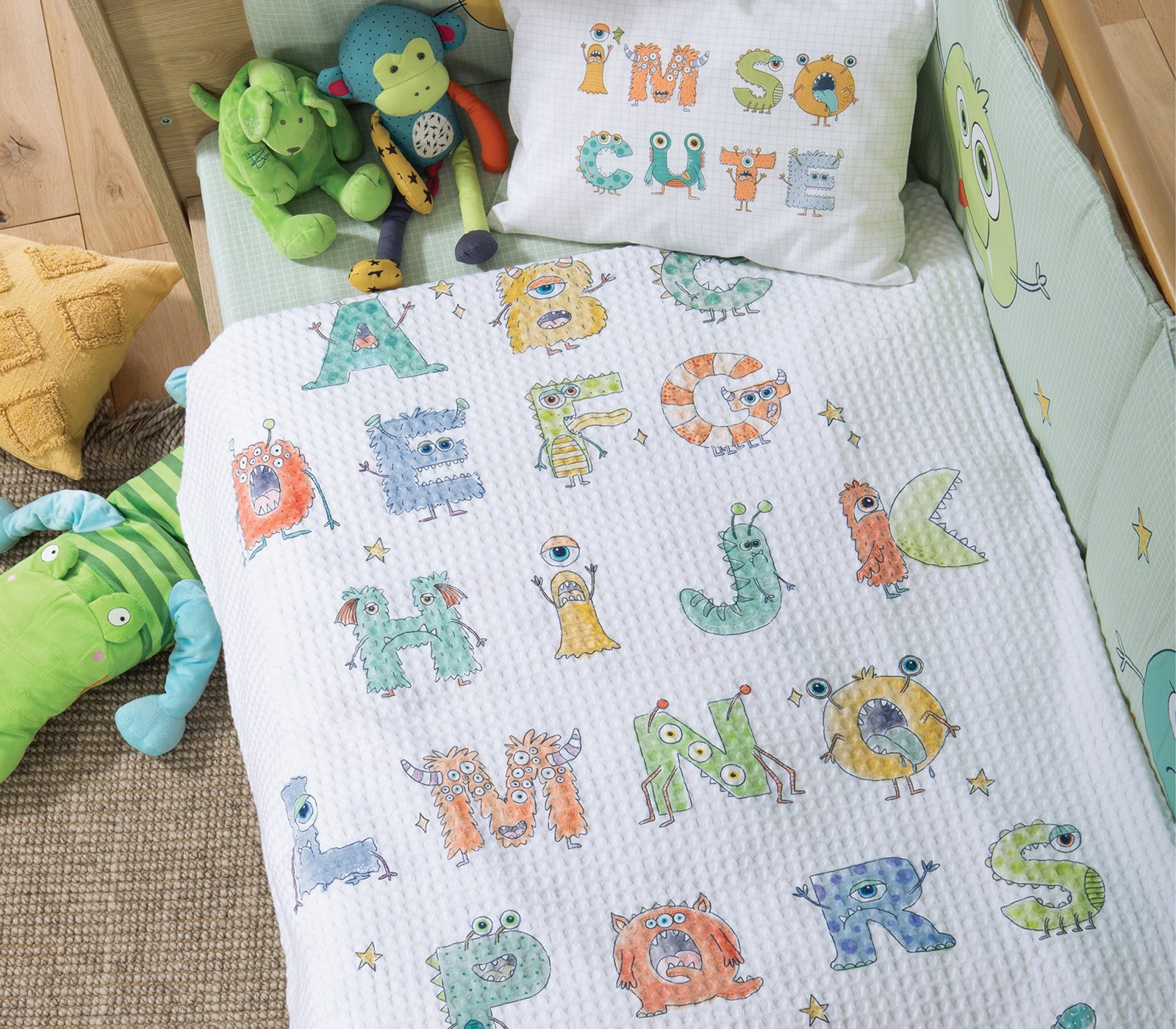 5205495605166 Κουβέρτα Πικέ Κούνιας 110×150 Nef Nef Alphabet Monster White - Image 1